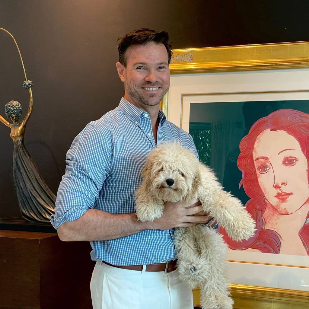 Curator Reed V. Horth (with Gigi) and Andy Warhol's "Birth of Venus" (F&S.II.316) in Miami
